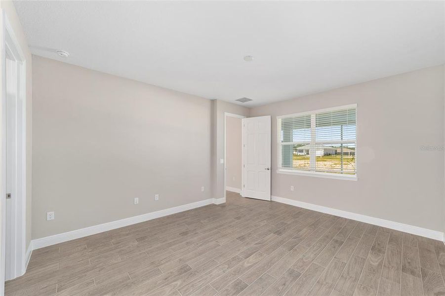 Spacious, unfurnished interior of a new home in On Top of the World Communities, Ocala (Image 35).