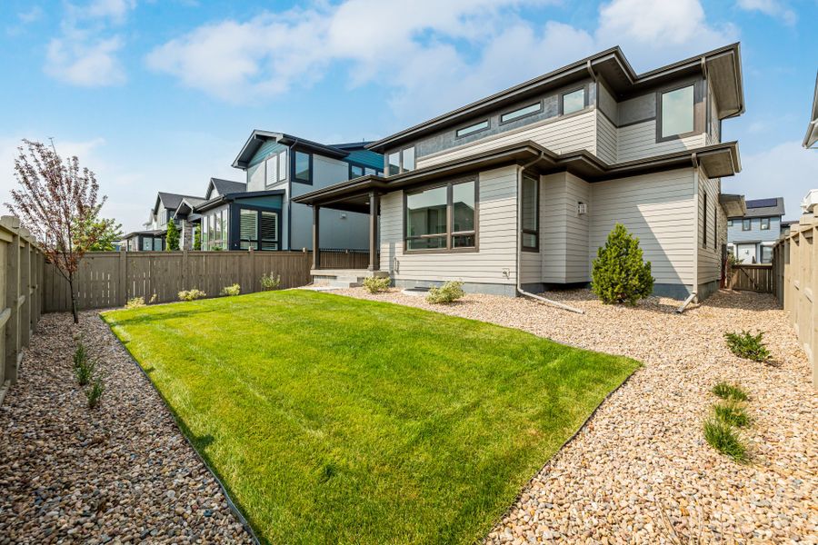 Front exterior of a new home in West Grange, Longmont, CO, highlighting curb appeal (Image 28).
