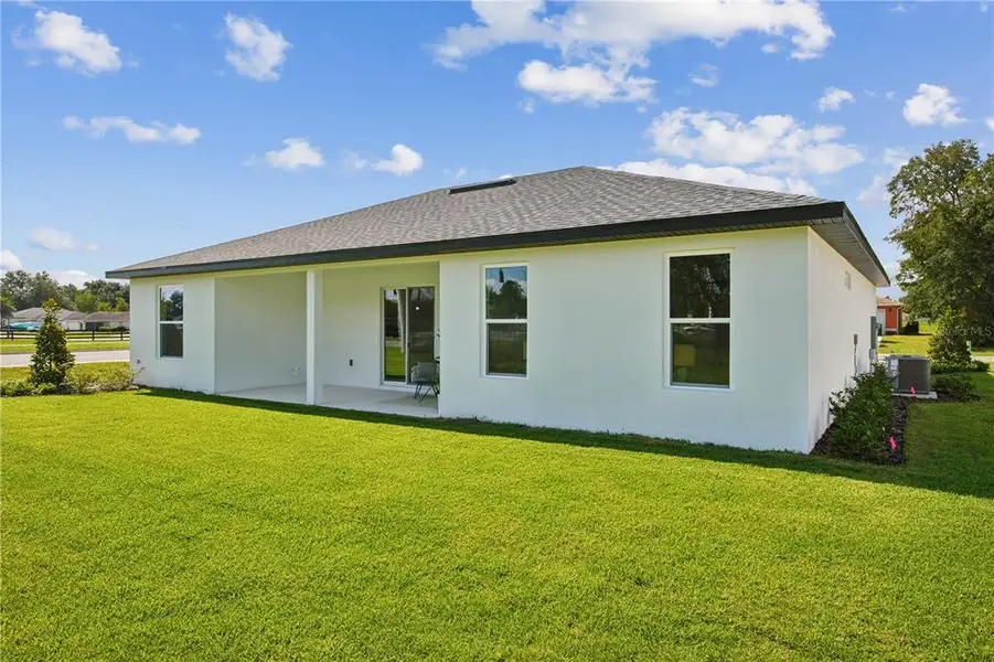 Exterior details and patio area of a home in , Palm Coast (Image 3). Exterior details and patio area of a home in , Palm Coast (Image 3).