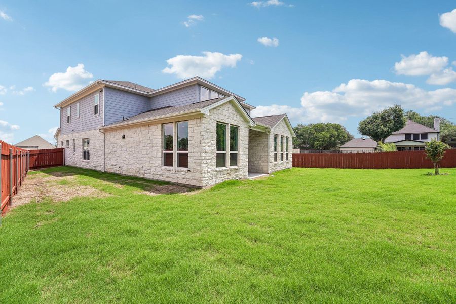 Exterior details and patio area of a home in Sauls Ranch, Round Rock (Image 18).