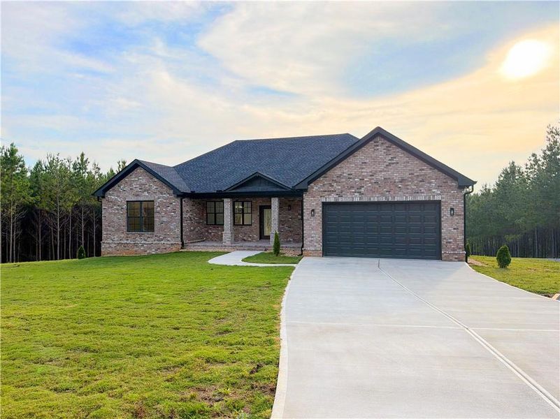 Front exterior of a new home in , Forsyth, GA, highlighting curb appeal (Image 2). Front exterior of a new home in , Forsyth, GA, highlighting curb appeal (Image 2).