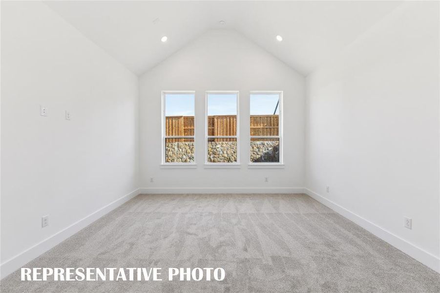 This dreamy owners suite combines high ceilings and oversized windows to create a relaxing and peaceful retreat.  REPRESENTATIVE PHOTO