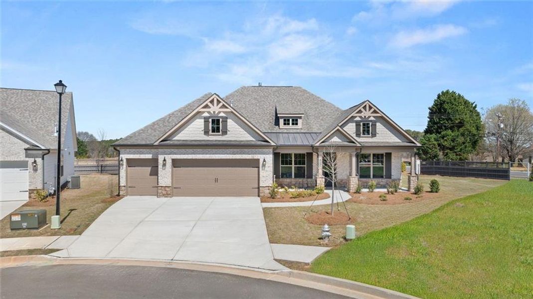 Front exterior of a new home in Soleil Summit Chase, Snellville, GA, highlighting curb appeal (Image 18).