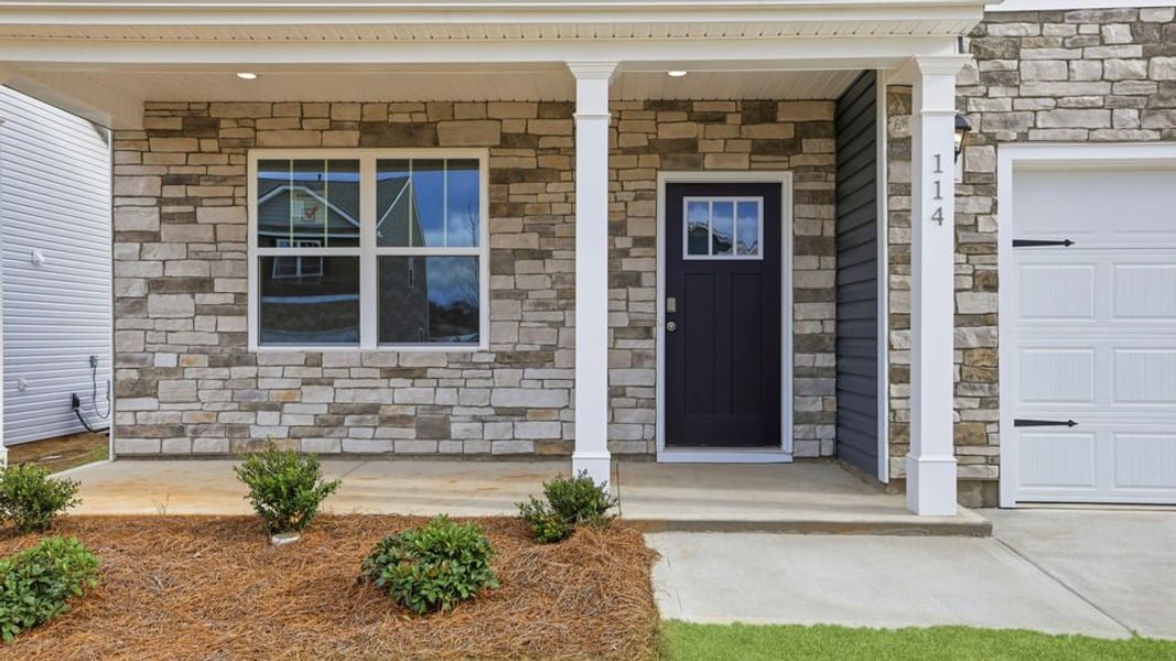 Exterior details and patio area of a home in Waverly Station, Greenwood (Image 3).