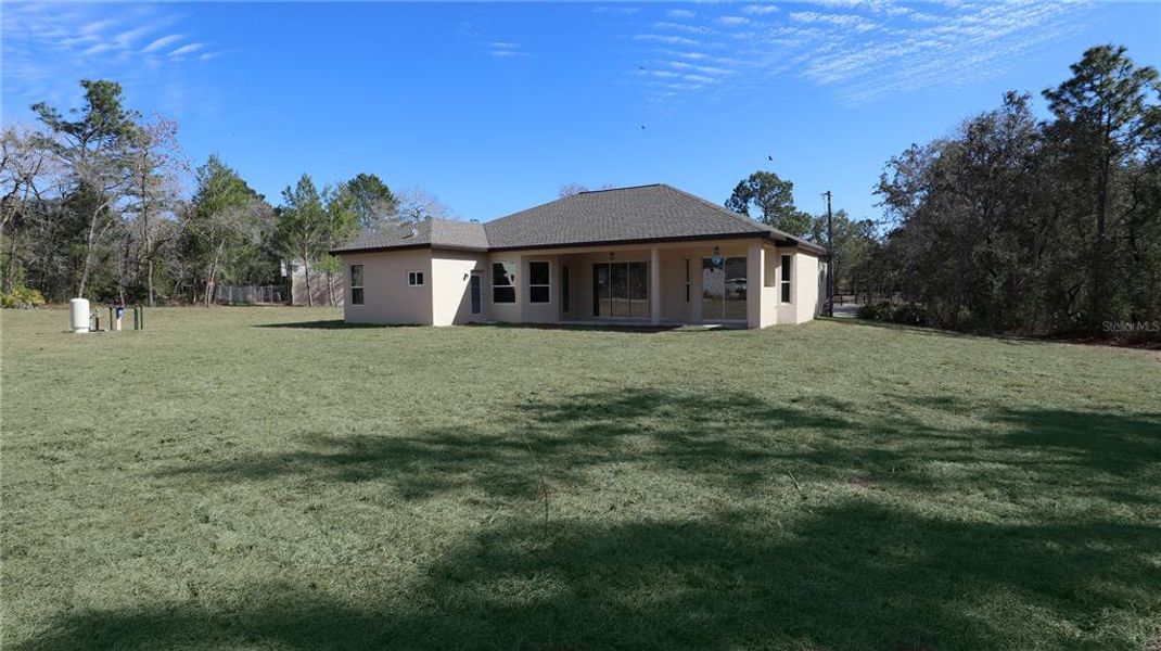 Exterior details and patio area of a home in , Brooksville (Image 19).