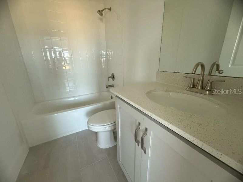 Furnished interior view inside a new home in Parkview at Hamlin, Winter Garden (Image 7).