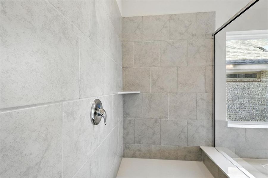 Bathroom with a tile shower Bathroom with a tile shower