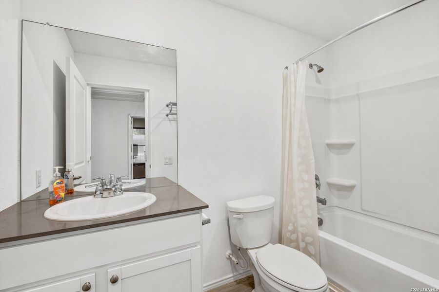 Furnished interior view inside a new home in Tarasco Gardens, San Antonio (Image 4).