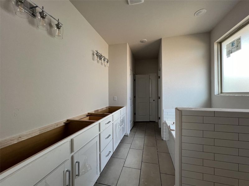 In-progress construction of a new home in Rolling Glen, Hutto, TX (Image 24).