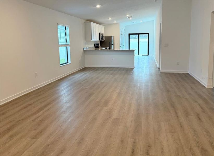 Spacious, unfurnished interior of a new home in The Crossing at Palm River, Tampa (Image 7).