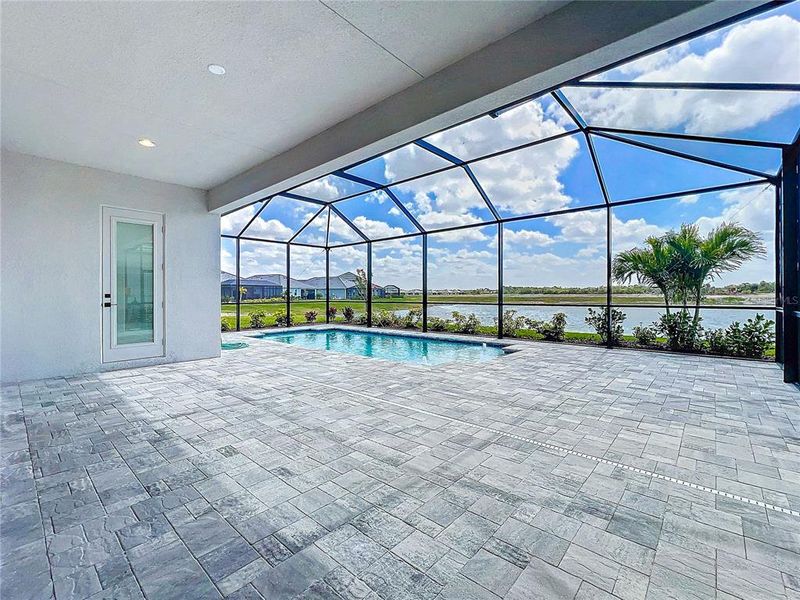 Exterior details and patio area of a home in Watercolor Place, Bradenton (Image 29).