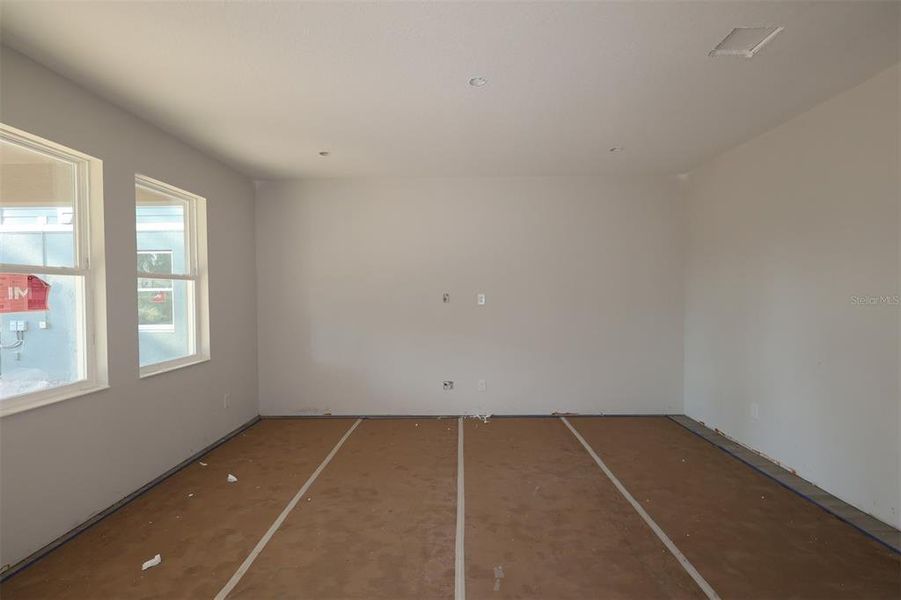 In-progress construction of a new home in Eden at Crossprairie, St. Cloud, FL (Image 10).