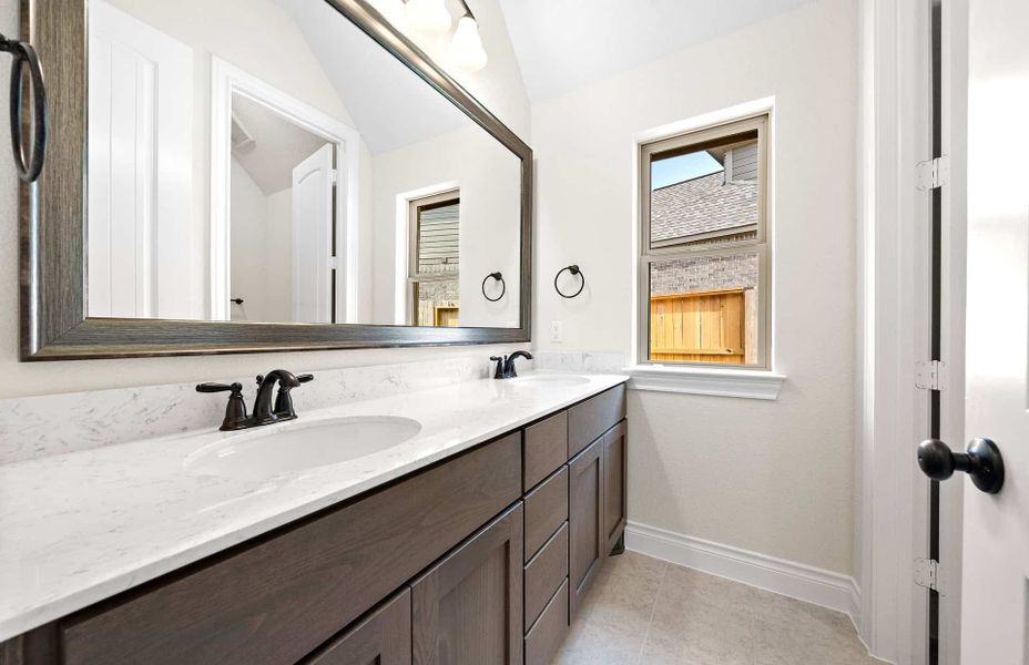 Representative furnished interior of a home built from the 2500 by Ravenna Homes in The Highlands 55′, Porter (Image 14). Representative furnished interior of a home built from the 2500 by Ravenna Homes in The Highlands 55′, Porter (Image 14).
