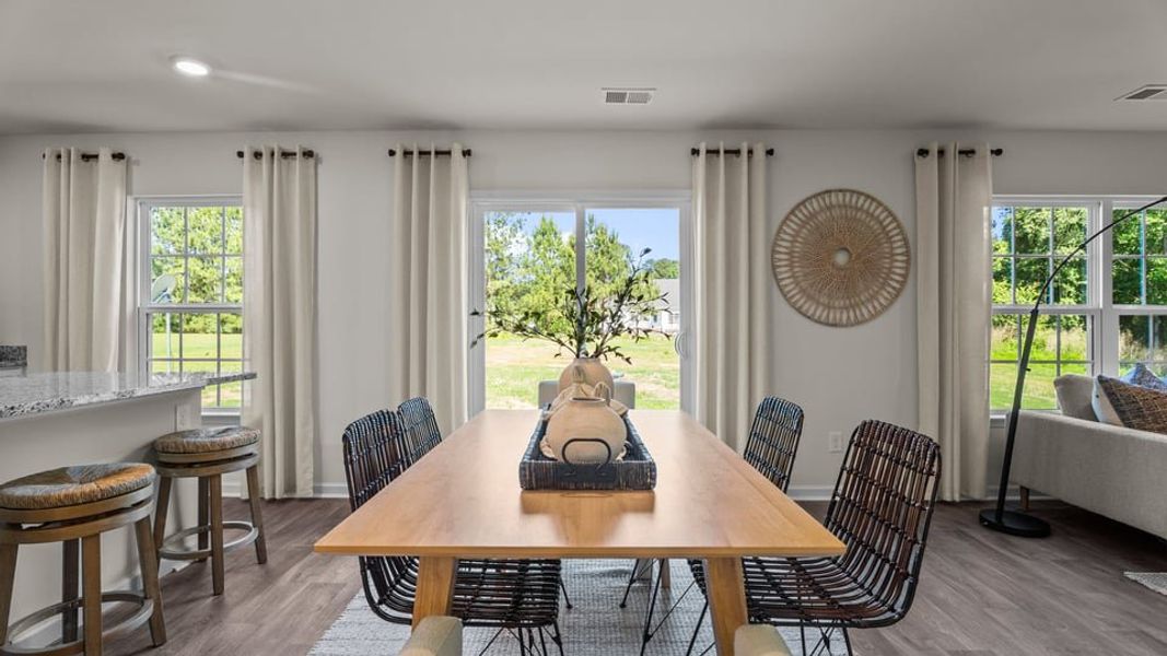 Representative furnished interior of a home built from the BELHAVEN by D.R. Horton in Honeycutt Oaks, Angier (Image 10).