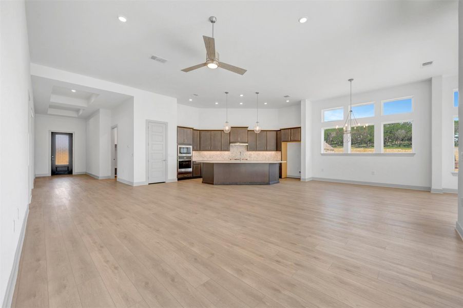 Entry Way - Family Room - Kitchen - Dining Area