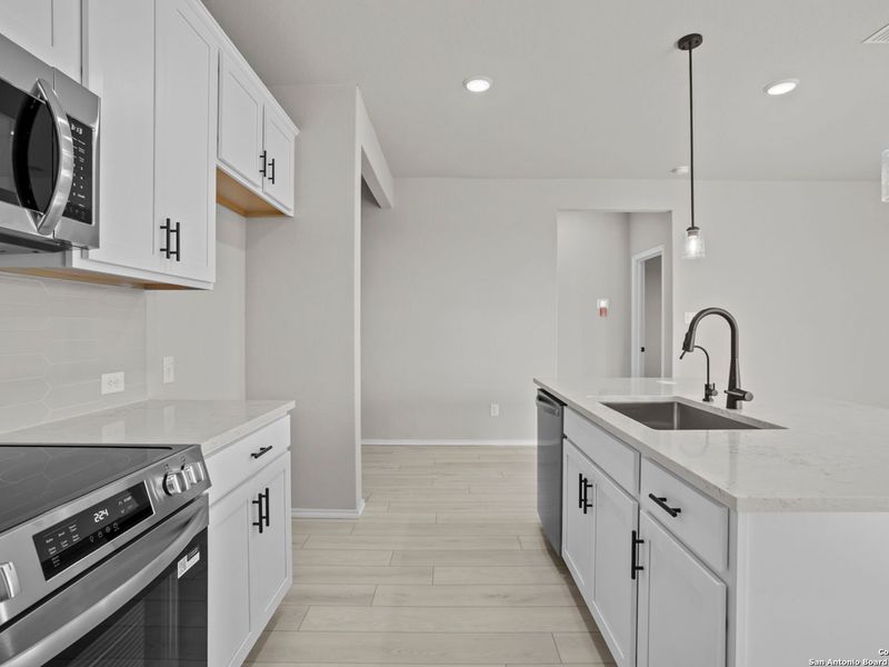 Furnished interior view inside a new home in Hannah Heights, Seguin (Image 7).