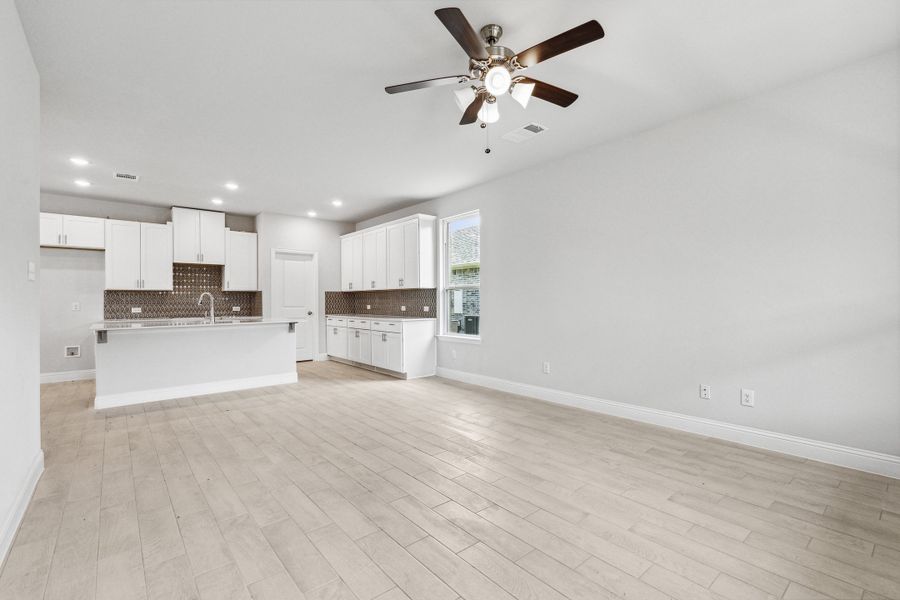 Representative unfurnished interior of a home built from the Lyla by Megatel Homes in Santorini, Seagoville (Image 10).