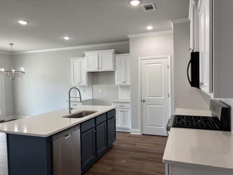 Furnished interior view inside a new home in , Suwanee (Image 7).