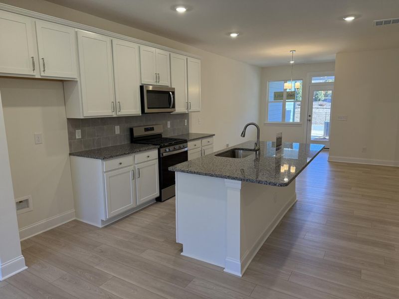 Furnished interior view inside a new home in Enclave at Traditions Townhomes, Wake Forest (Image 7).