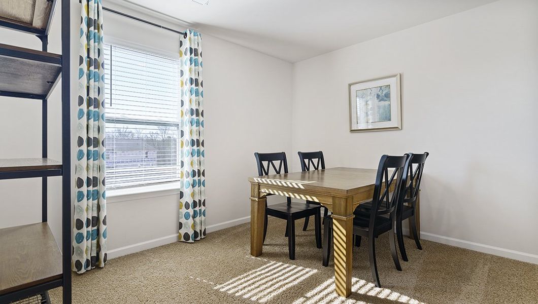 Representative furnished interior of a home built from the Penwell by D.R. Horton in Sage Grove, Lyman (Image 25).