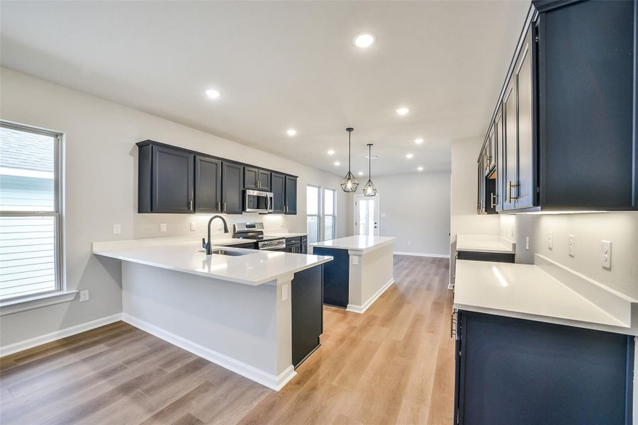 Furnished interior view inside a new home in Mostyn Springs, Magnolia (Image 7). Furnished interior view inside a new home in Mostyn Springs, Magnolia (Image 7).