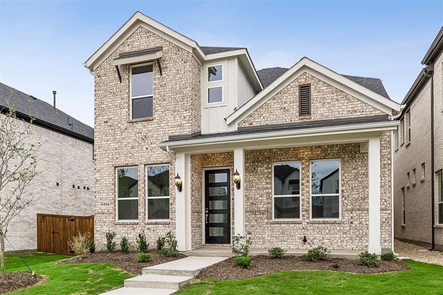 Front exterior of a new home in Lexington Frisco, Frisco, TX, highlighting curb appeal (Image 1). Front exterior of a new home in Lexington Frisco, Frisco, TX, highlighting curb appeal (Image 1).