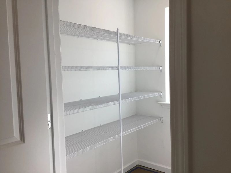 Pantry featuring the AW Collection® Coastal - storage with ocean tones.