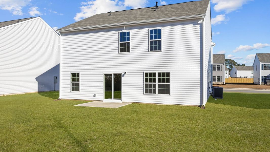 Exterior details and patio area of a home in Madeline Farm, New Bern (Image 26).