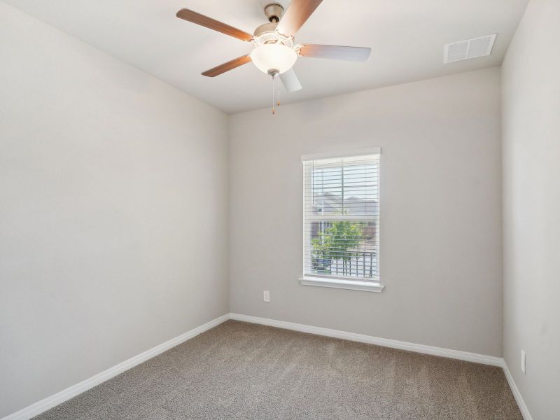 Spacious, unfurnished interior of a new home in Turner's Crossing - Reserve Collection, Buda (Image 12).