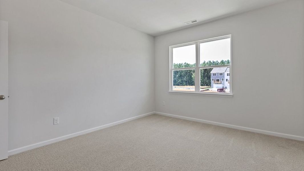 Representative unfurnished interior of a home built from the DANIEL by D.R. Horton in The Townes Park, Apex (Image 29). Representative unfurnished interior of a home built from the DANIEL by D.R. Horton in The Townes Park, Apex (Image 29).
