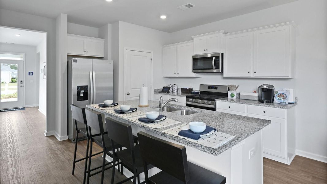 Furnished interior view inside a new home in Pine Hills at Cane Bay, Summerville (Image 10). Furnished interior view inside a new home in Pine Hills at Cane Bay, Summerville (Image 10).