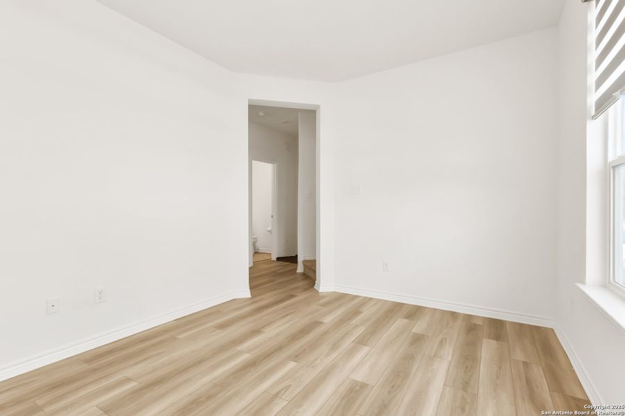 Spacious, unfurnished interior of a new home in Cove at Westover Hills, San Antonio (Image 21).