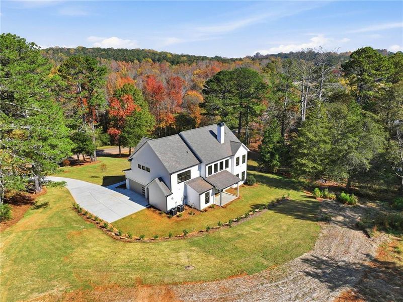 Front exterior of a new home in , Monroe, GA, highlighting curb appeal (Image 26).
