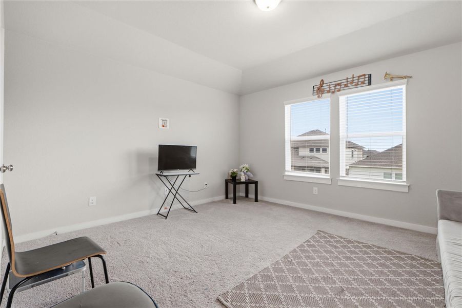 Furnished interior view inside a new home in University Heights, Round Rock (Image 33).