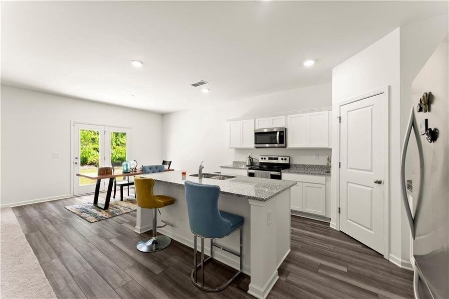Furnished interior view inside a new home in Meriwether Place, Villa Rica (Image 13).