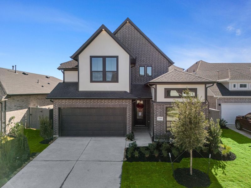 Front exterior of a new home in Jubilee 45', 70', Hockley, TX, highlighting curb appeal (Image 2). Front exterior of a new home in Jubilee 45', 70', Hockley, TX, highlighting curb appeal (Image 2).