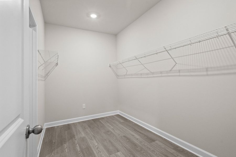 Spacious, unfurnished interior of a new home in Cypress Ridge - The Coastline Series, Longs (Image 23).