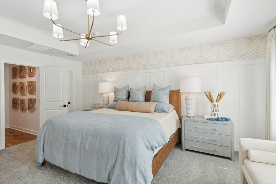 Primary suite with decorative feature wall