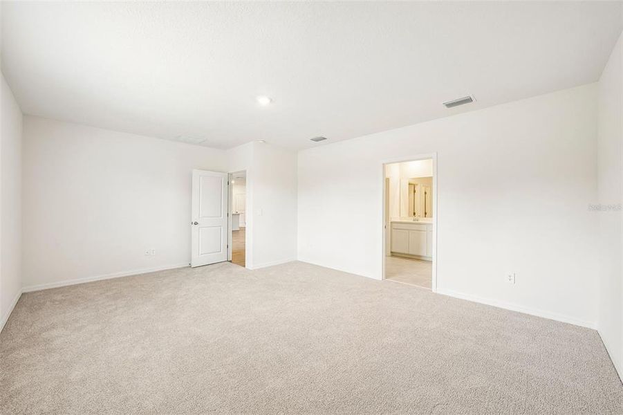 Spacious, unfurnished interior of a new home in Pine Ridge Meadows, Hudson (Image 56).