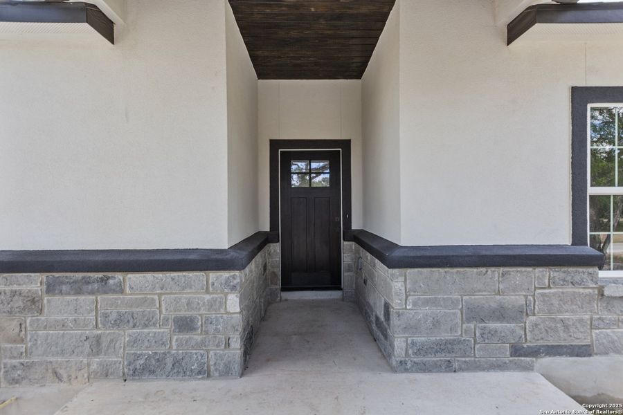 Exterior details and patio area of a home in , Spring Branch (Image 1). Exterior details and patio area of a home in , Spring Branch (Image 1).