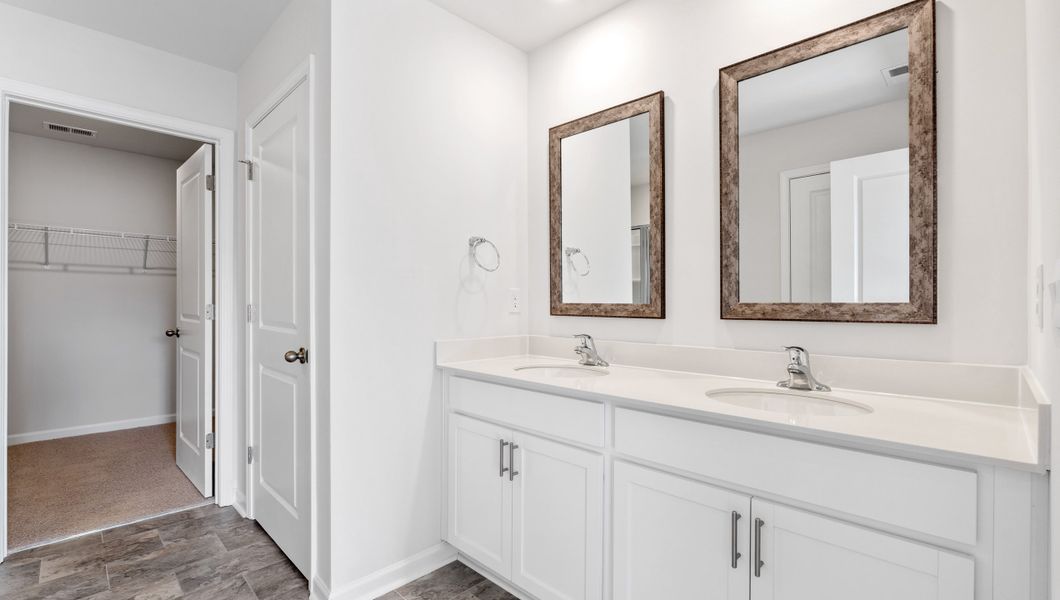 Representative furnished interior of a home built from the PENWELL by D.R. Horton in Cascade Point, Seneca (Image 14).