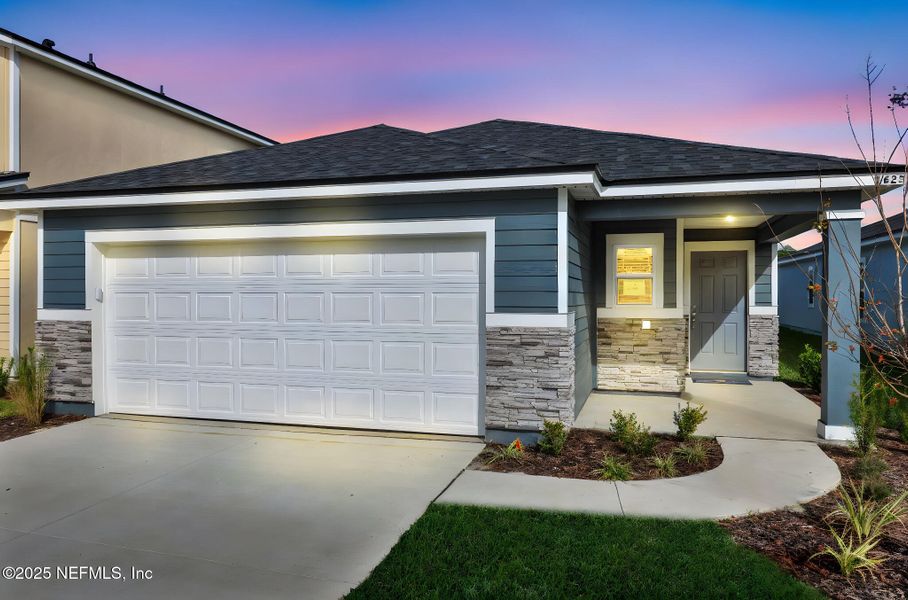 Front exterior of a new home in Cedar Creek, Jacksonville, FL, highlighting curb appeal (Image 20).
