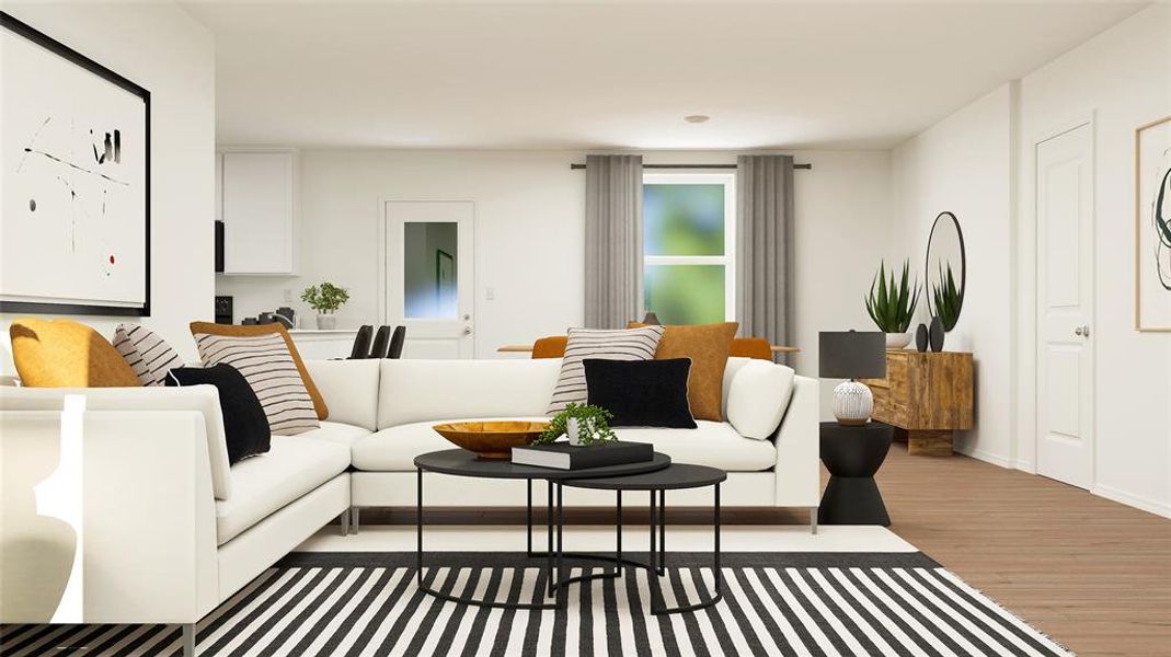 Living room with light hardwood / wood-style flooring