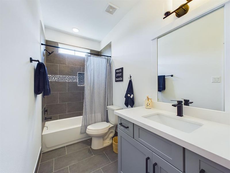 MOVE-IN READY! Full secondary bathroom with tub & shower head. FINISHES & FLOOR PLANS WILL VARY!