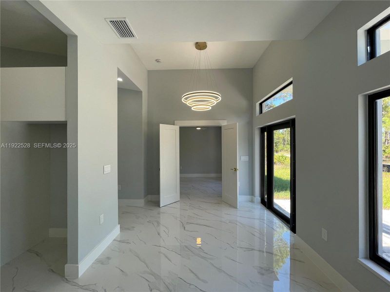Spacious, unfurnished interior of a new home in , Lehigh Acres (Image 18). Spacious, unfurnished interior of a new home in , Lehigh Acres (Image 18).