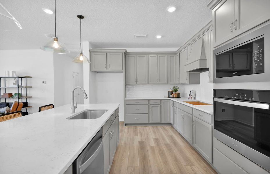 Representative furnished interior of a home built from the Medina by Pulte Homes in Hyland Trail, Green Cove Springs (Image 7).