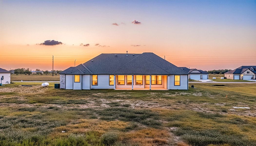 The spacious backyard offers a peaceful, private setting with a fully fenced yard and covered patio. Whether enjoying quiet moments outdoors, gardening, or entertaining guests, this versatile space provides the perfect balance of relaxation and functionality. The spacious backyard offers a peaceful, private setting with a fully fenced yard and covered patio. Whether enjoying quiet moments outdoors, gardening, or entertaining guests, this versatile space provides the perfect balance of relaxation and functionality.