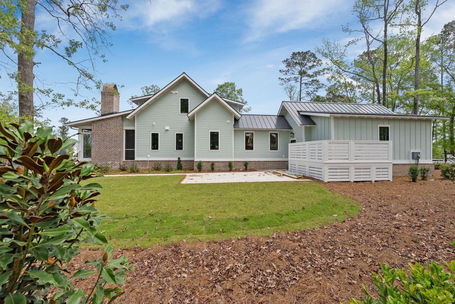 Front exterior of a new home in , Ravenel, SC, highlighting curb appeal (Image 33).