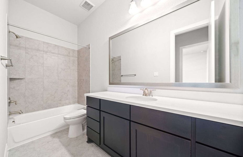 Representative furnished interior of a home built from the 3054 by Ravenna Homes in The Highlands 55′, Porter (Image 16). Representative furnished interior of a home built from the 3054 by Ravenna Homes in The Highlands 55′, Porter (Image 16).