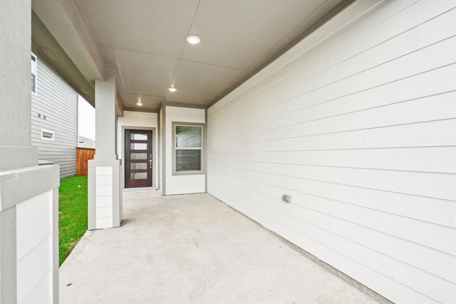 Exterior details and patio area of a home in Lakehaven - Spring Series, Farmersville (Image 4).